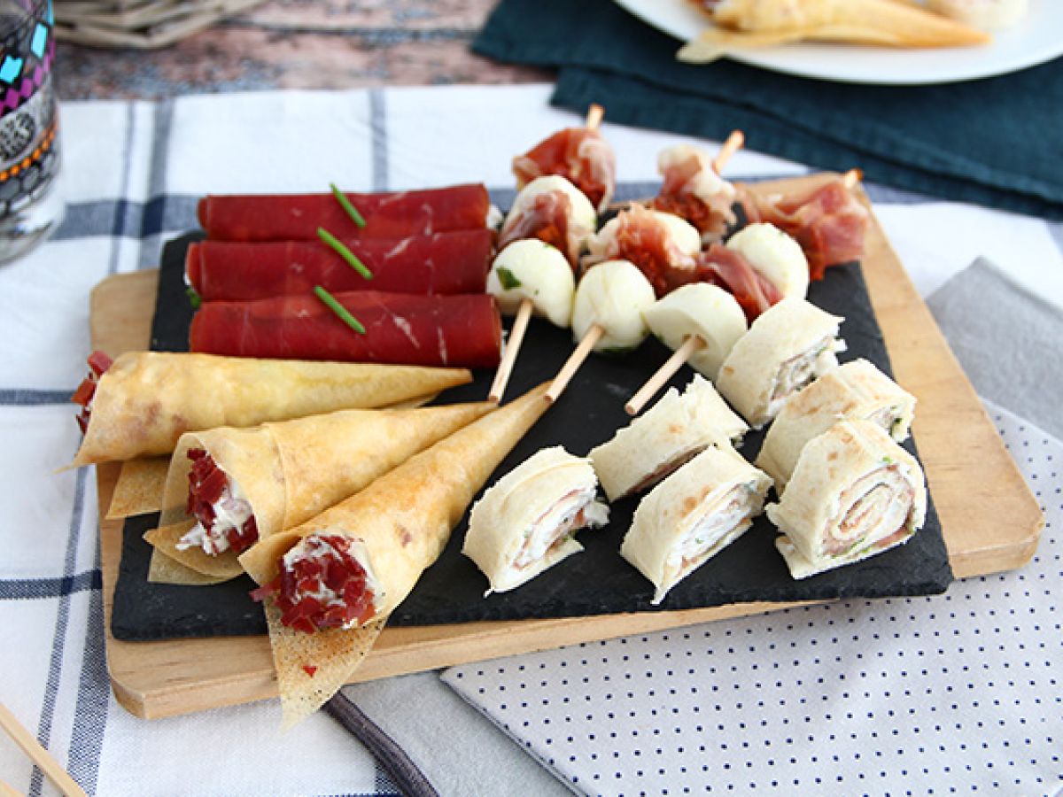 Kuivattua lihaa sisältävien aperitiivien kvartetti